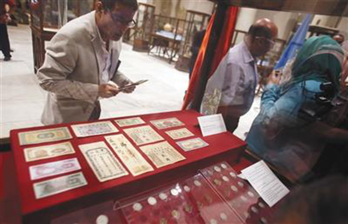 埃及首次向中国归还13件查获文物 其中含光绪年间银票